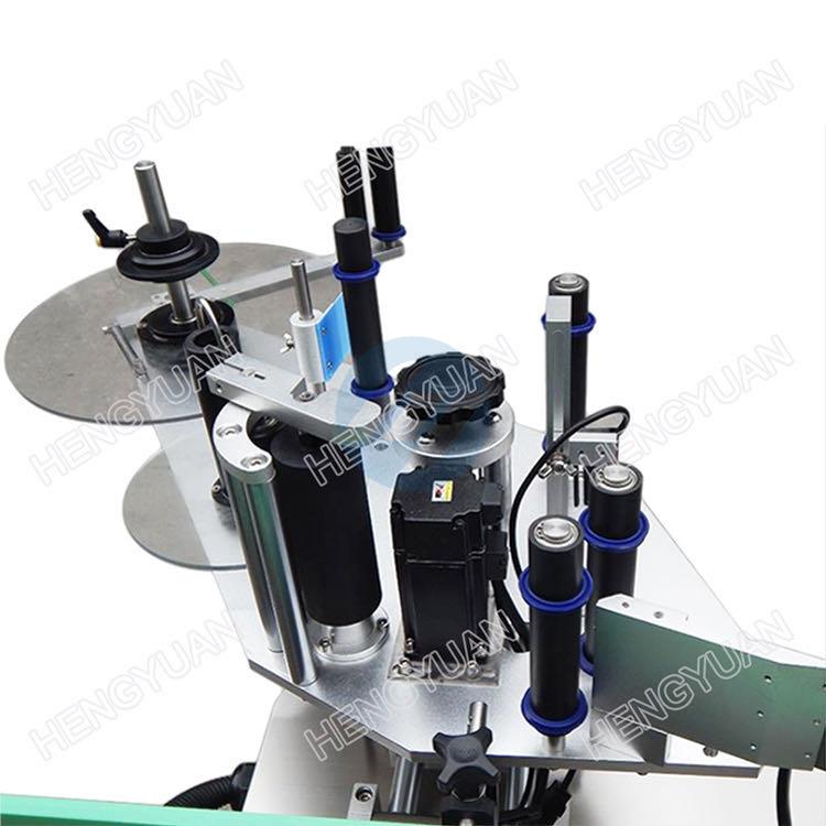 Automatic hand sanitizer bottle labeling machinery