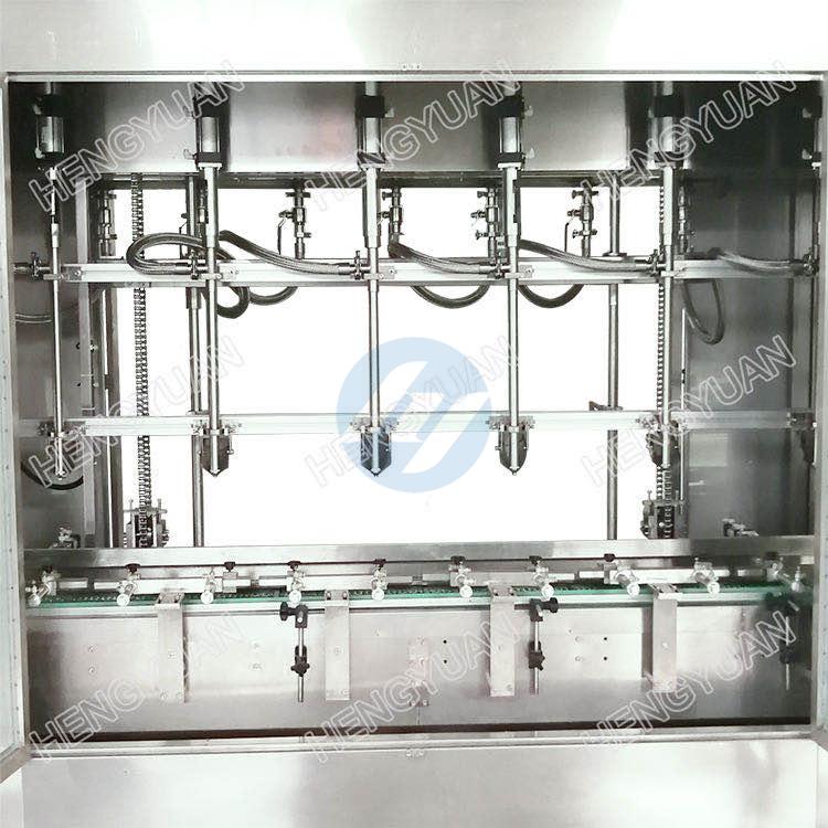 Automatic weighing bottle filler