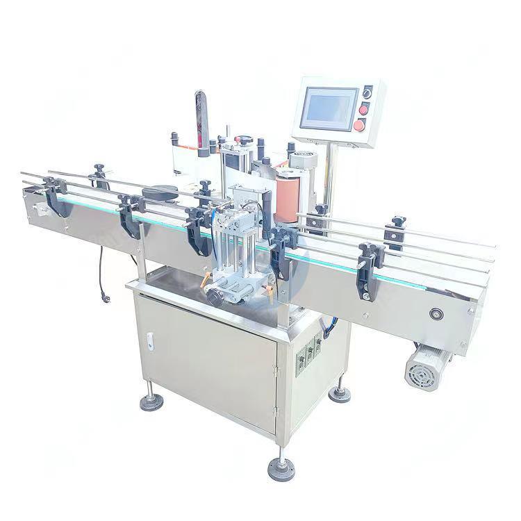automatic positioning round bottle labeler