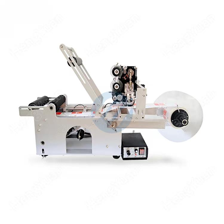 Desktop round glass jar labeling machine with ribbon coding device