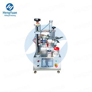 Semi-automatic Tape Sealing Machine Semi-automatic Tape Sealing Machine